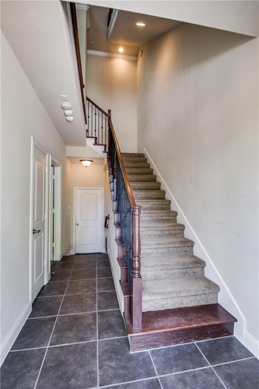 This staircase leads to the 2nd floor which is hom
