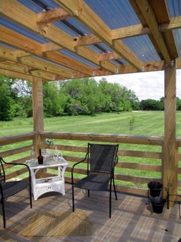NEW COVERED FRONT DECK WITH A SCENIC EAST VIEW