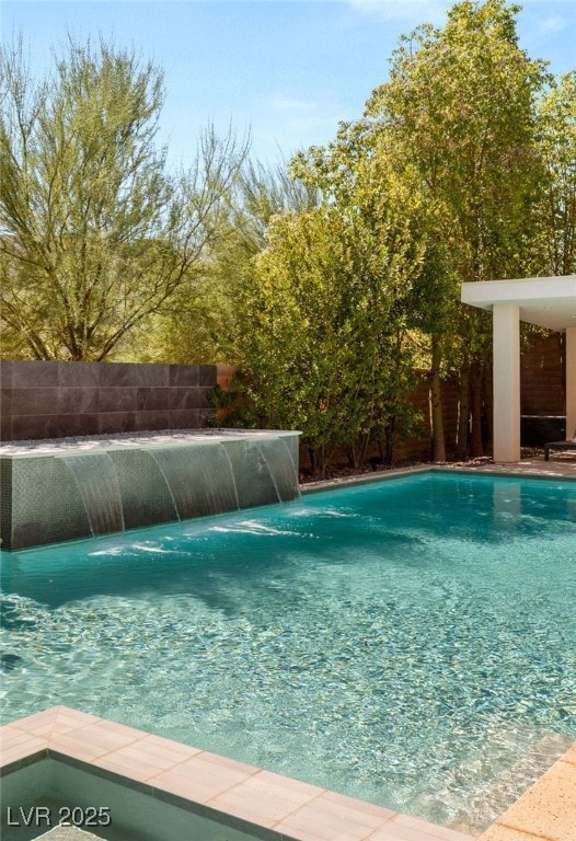 Waterfall feature along with lighted pool and built in filtration system