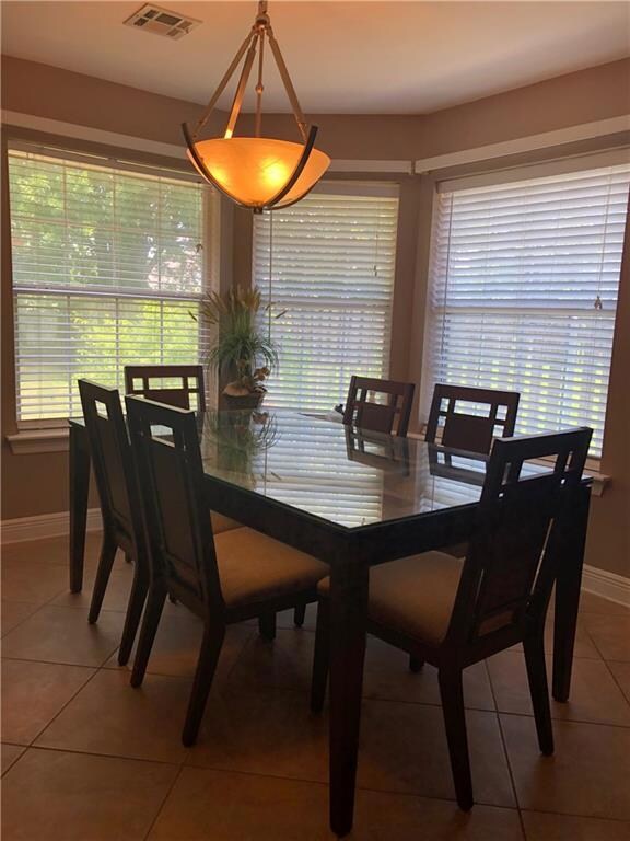 Large breakfast area with stone flooring