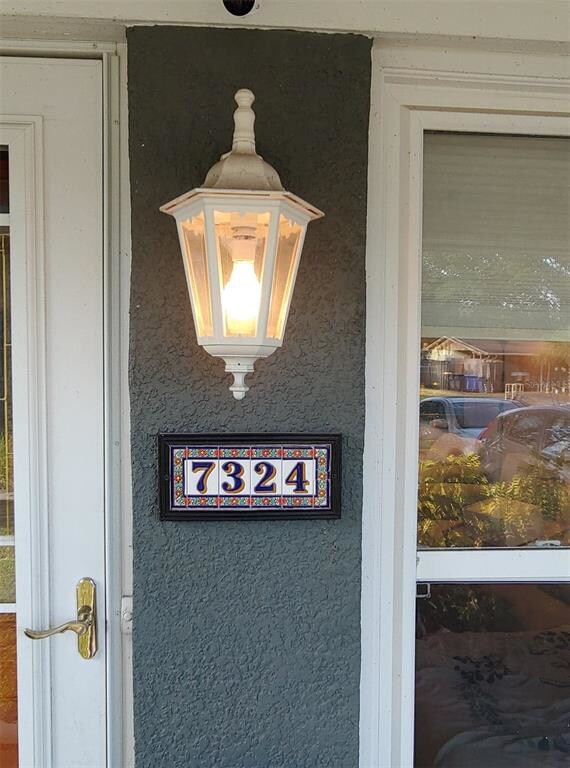 Storm door and keyless entry