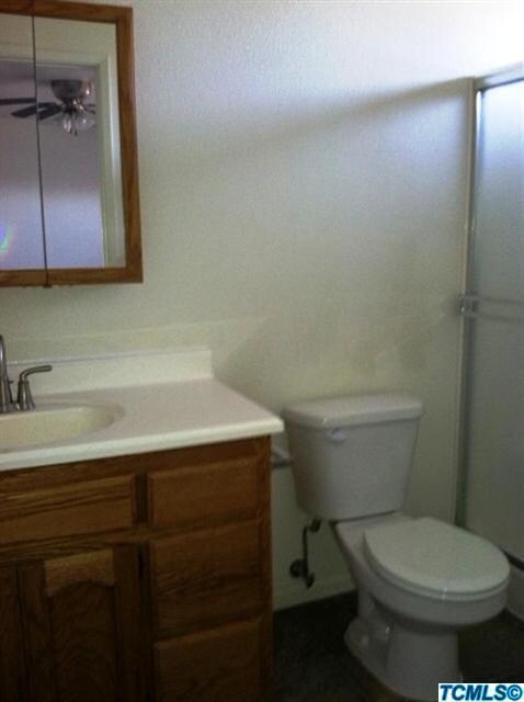 Master bathroom has higher vanity with o