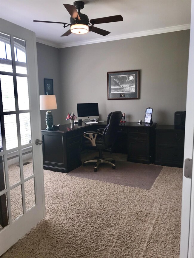 Office with French doors on main floor.