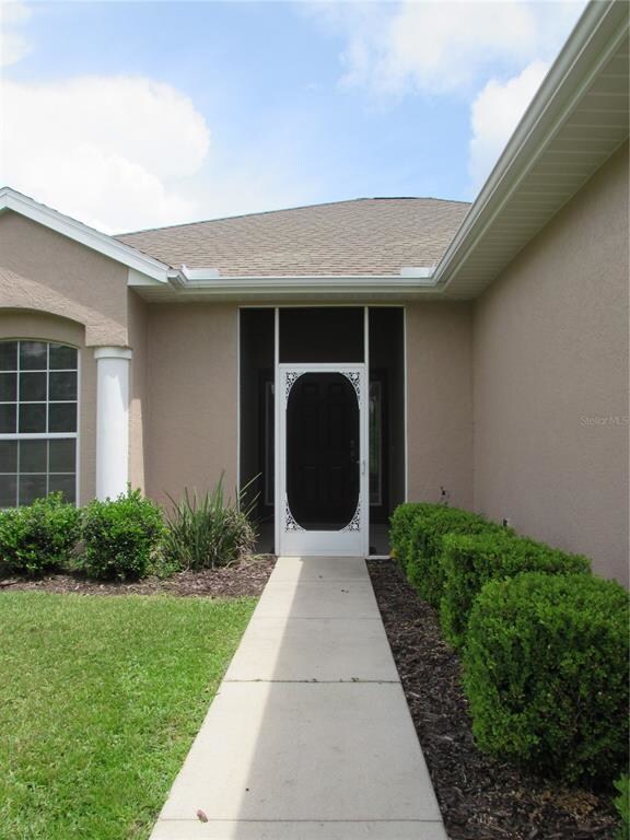 Entrance to the home is grand.