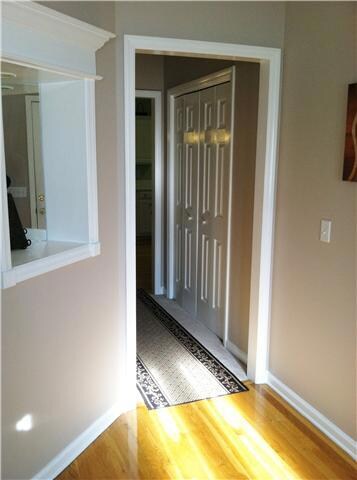 Inviting entry way with hardwood floors.
