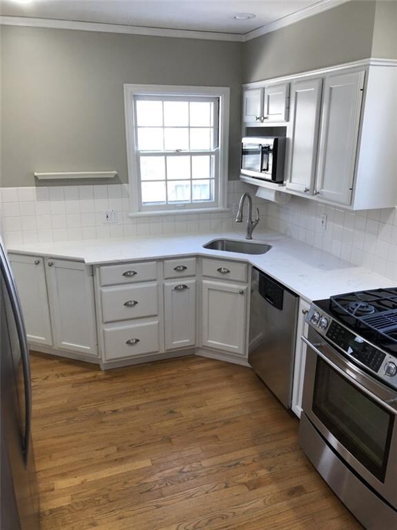 2613 33rd St, Des Moines, IA 50310 - photo 2