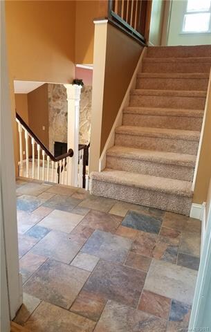 Foyer entry way with custom tile flooring