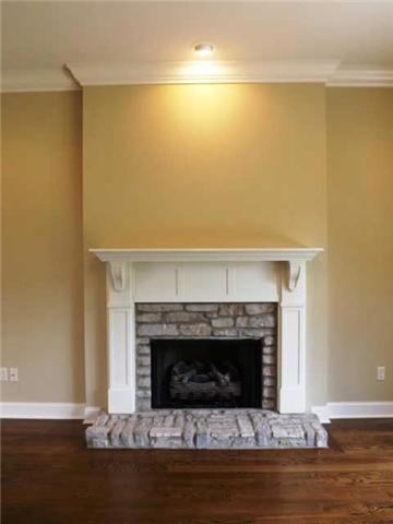 This custom stone fireplace will be the focal point of the living room. 