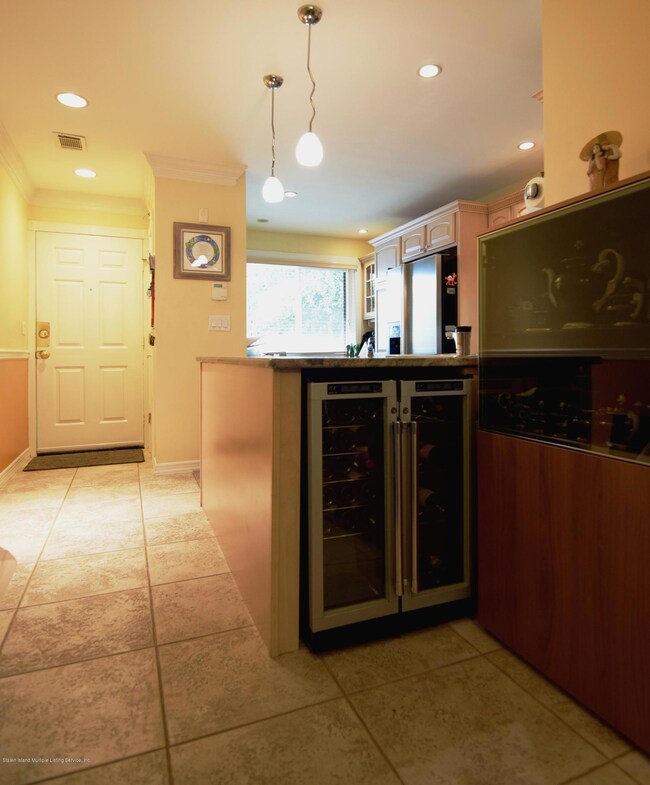 (6) Entry Foyer and Kitchen