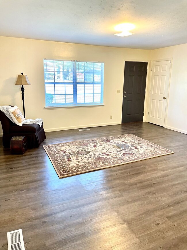 Luxury vinyl plank flooring throughout