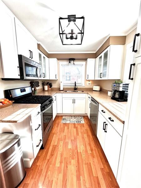 Bright and airy kitchen looking into back yard.