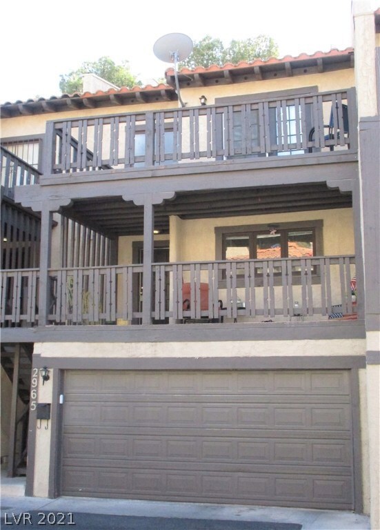 2 balconies, 2 car garage, low maintenance!