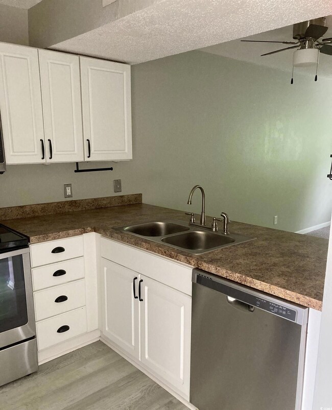 Kitchen featuring appliances with stainless steel 