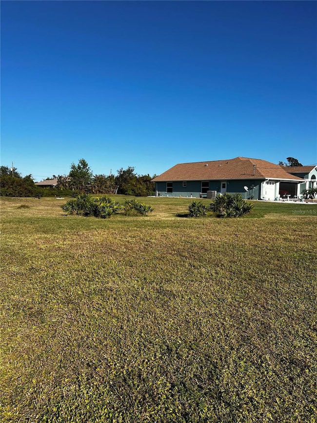 671 Boundary Blvd, Rotonda West, FL 33947 - photo 3