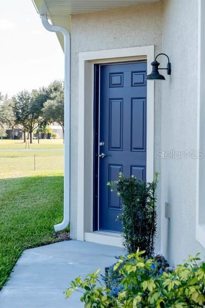 Front Entrance.  Door is now taller and may be a d