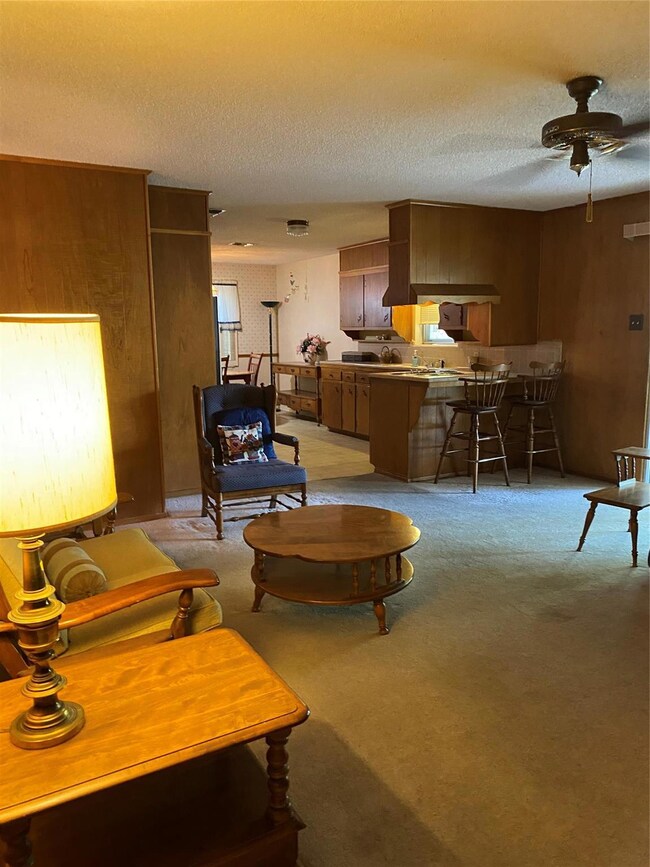 living rm. opens to kitchen.