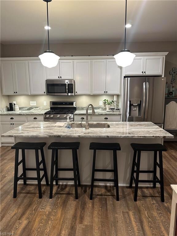 Kitchen with appliances with stainless steel finis
