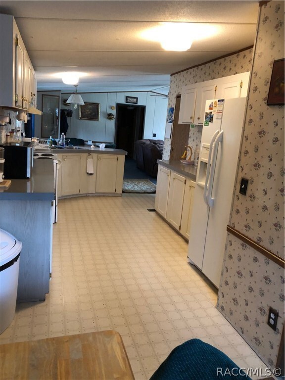 Pantry door in right background.