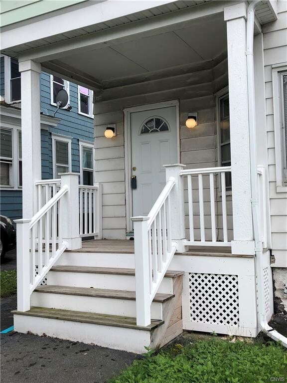 Updated porch leading to Upper Unit entry