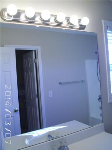 New light fixture in master bath.