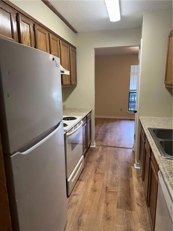 Kitchen including refrigerator