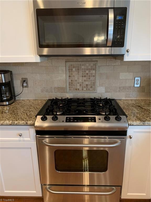 Gas range with tile back splash