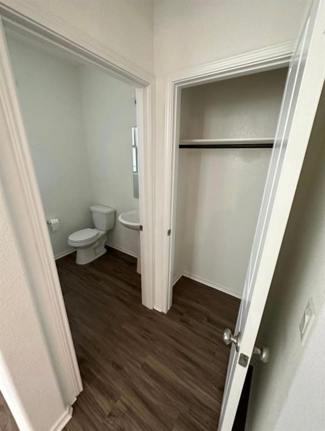Downstairs half bathroom and coat closet
