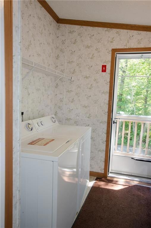 Laundry/mud room and side door just...