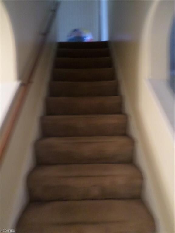 Steps going up to bedrooms & bath