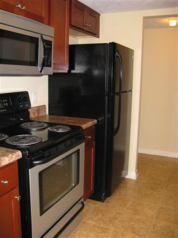 As mentioned, the kitchen has been completely gutted and replaced with stainless appliances.
