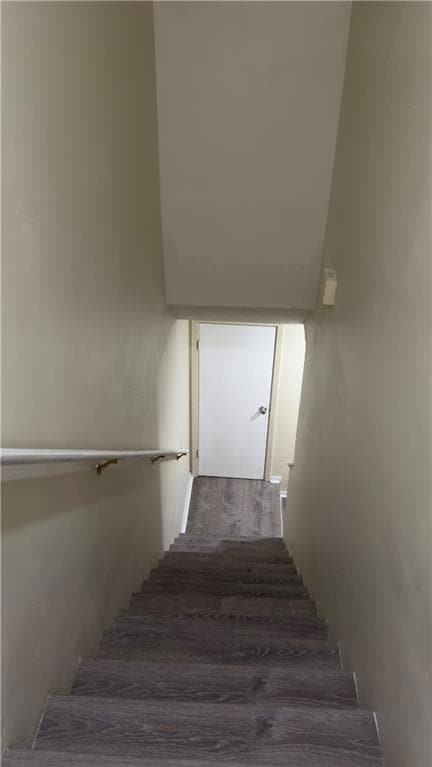 Staircase with wood finished floors
