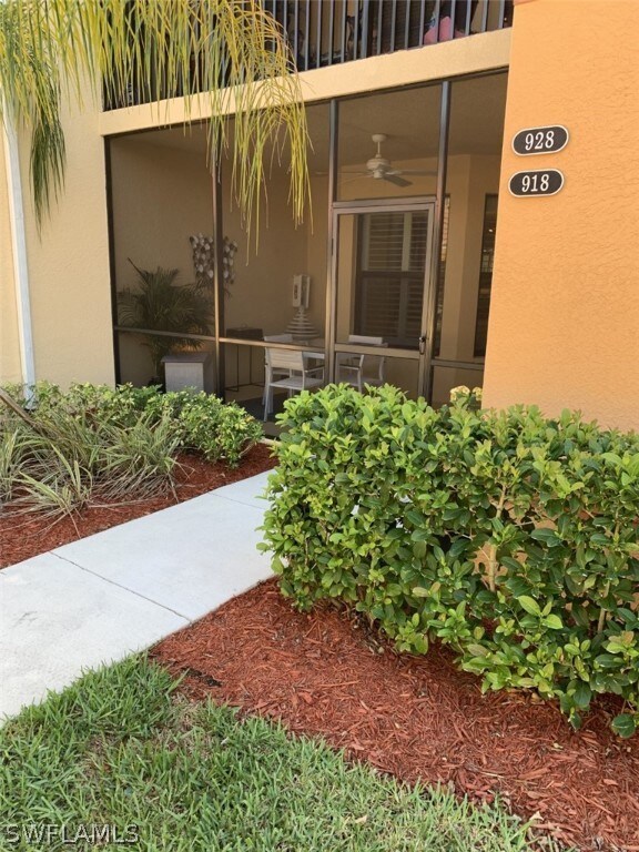 Wonderful front entry with screened in porch.  Also has a rear patio with fabulous lake views.