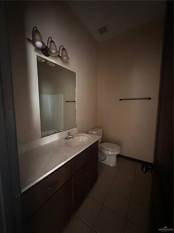 Bathroom featuring vanity and tile patterned flooring