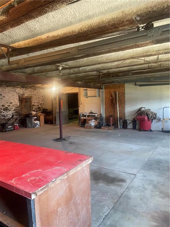 34'2x34'6 area with 2 garage doors