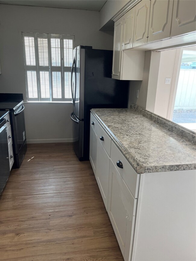 Another view of the kitchen looking towards dining