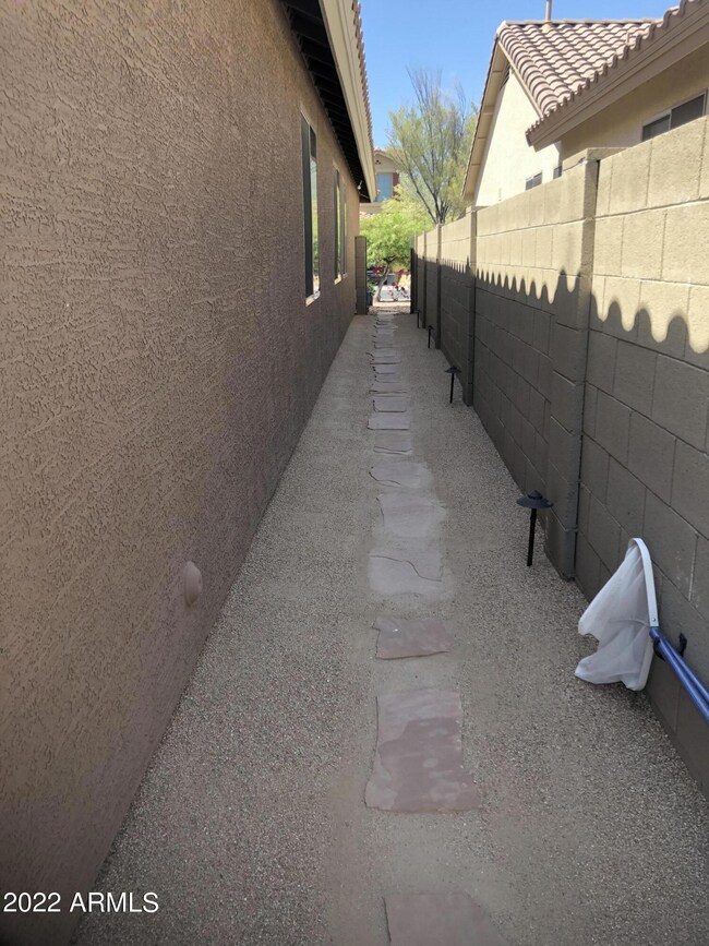 Side of house to front