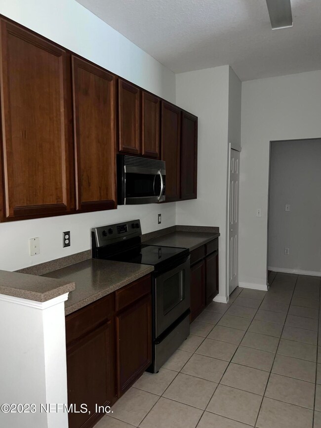 7063 Deer Lodge Cir unit 110, Jacksonville, FL 32256 - photo 6