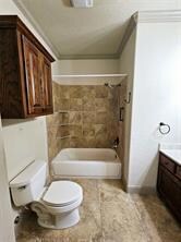 Bathroom with vanity, tub / shower combination, a