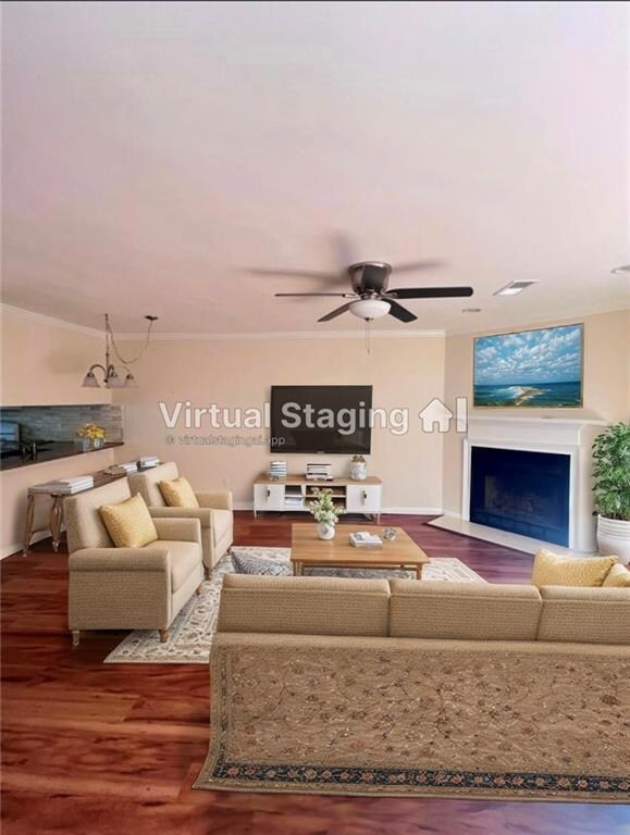 Living area with a fireplace with flush hearth, or