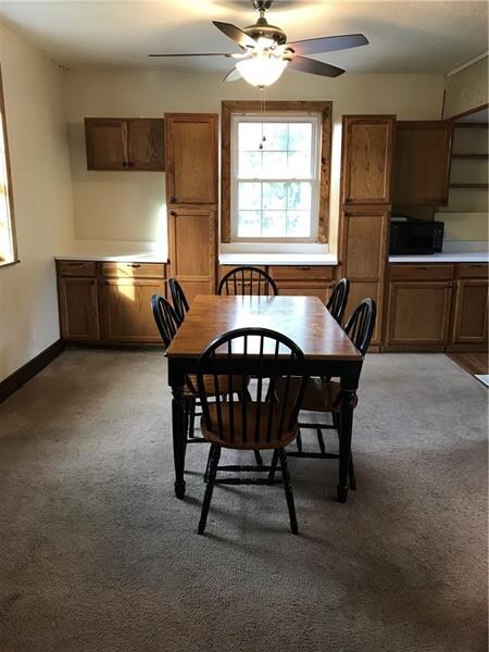 main floor dining area with an abundance of natura