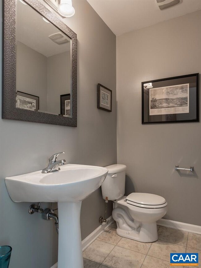 Guest bath isn’t cramped under the stairs