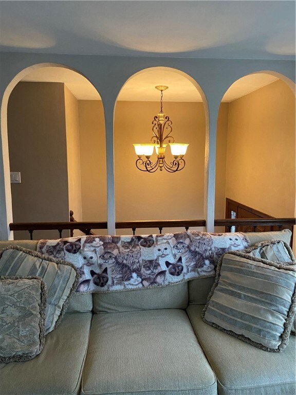 Living room view to beautiful light in entry way