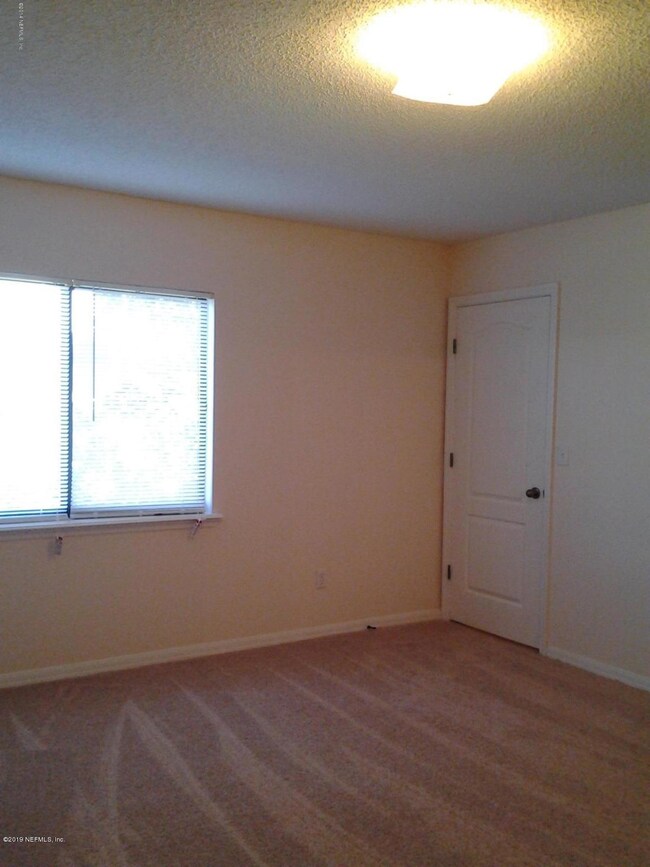 7709 Highchair Ln, Jacksonville, FL 32210 - photo 6