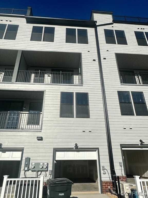 View of property with a garage