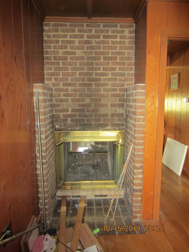 DUO SIDED FIREPLACE... OPEN TO LIVING ROOM AND THE MASTER BEDROOM