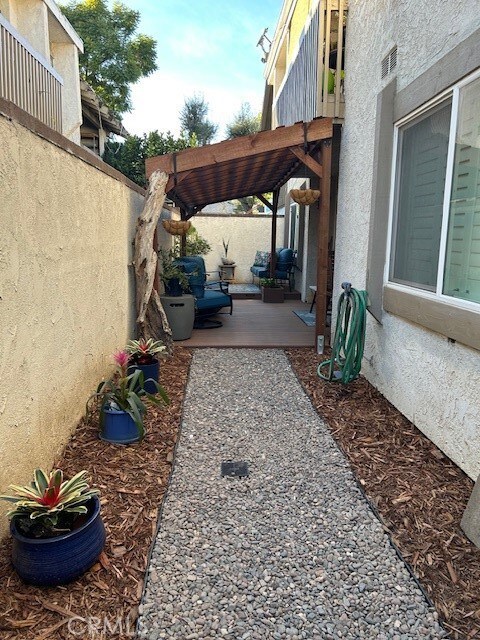 Private patio and beyond the deck is more space
