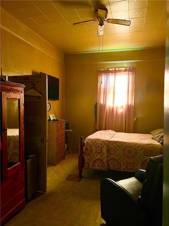 Bedroom featuring ceiling fan