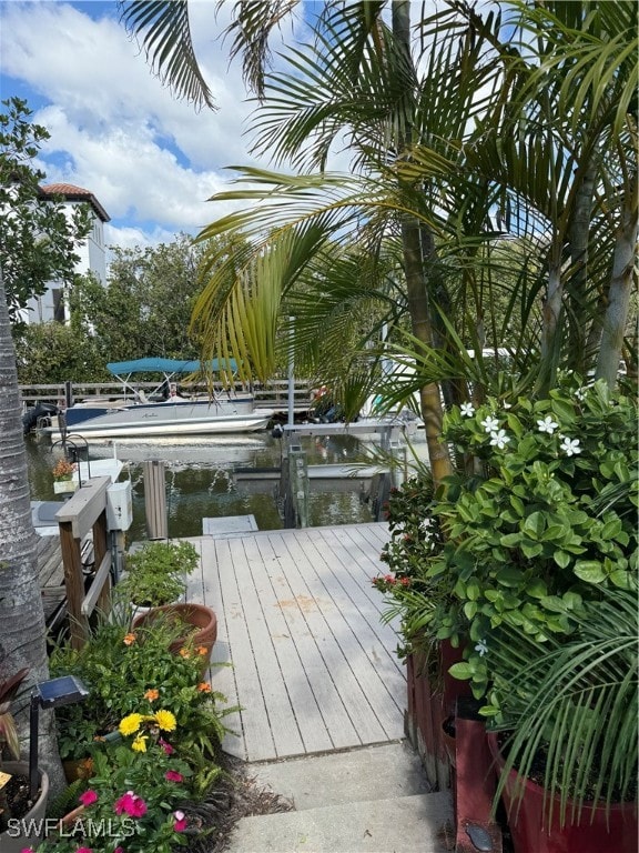 Wooden terrace featuring a dock