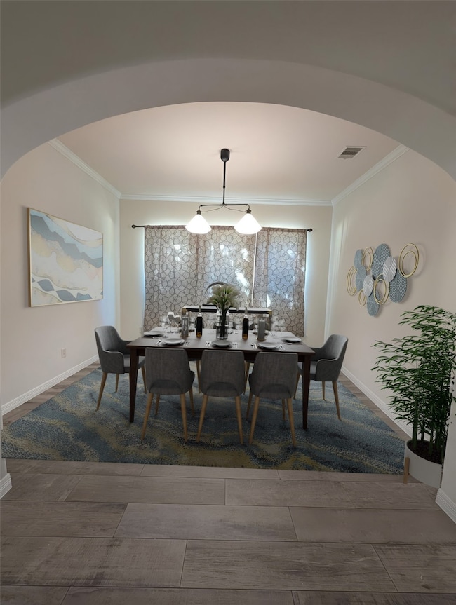 Dinner Party Ready…Every meal feels like a celebration in this elegant formal dining room. The dramatic archway sets the tone as you enter. Imagine holiday dinners, milestone moments, or quiet evenings with candles glowing—it all just feels right in this beautifully proportioned room. Sophisticated charm meets comfortable living, all in one picture-perfect space.