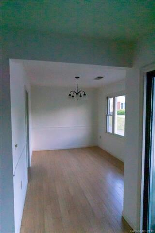 Dining Room from Living Room with door to Kitchen 